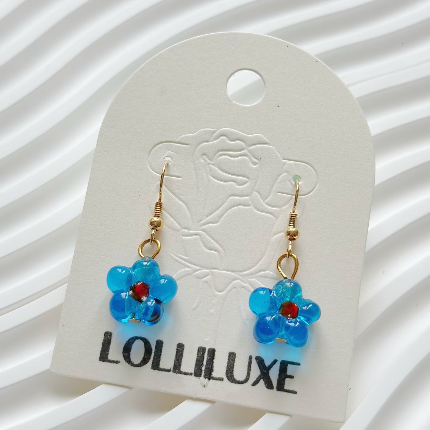 LolliLuxe Jewelry handcrafted glass earrings.