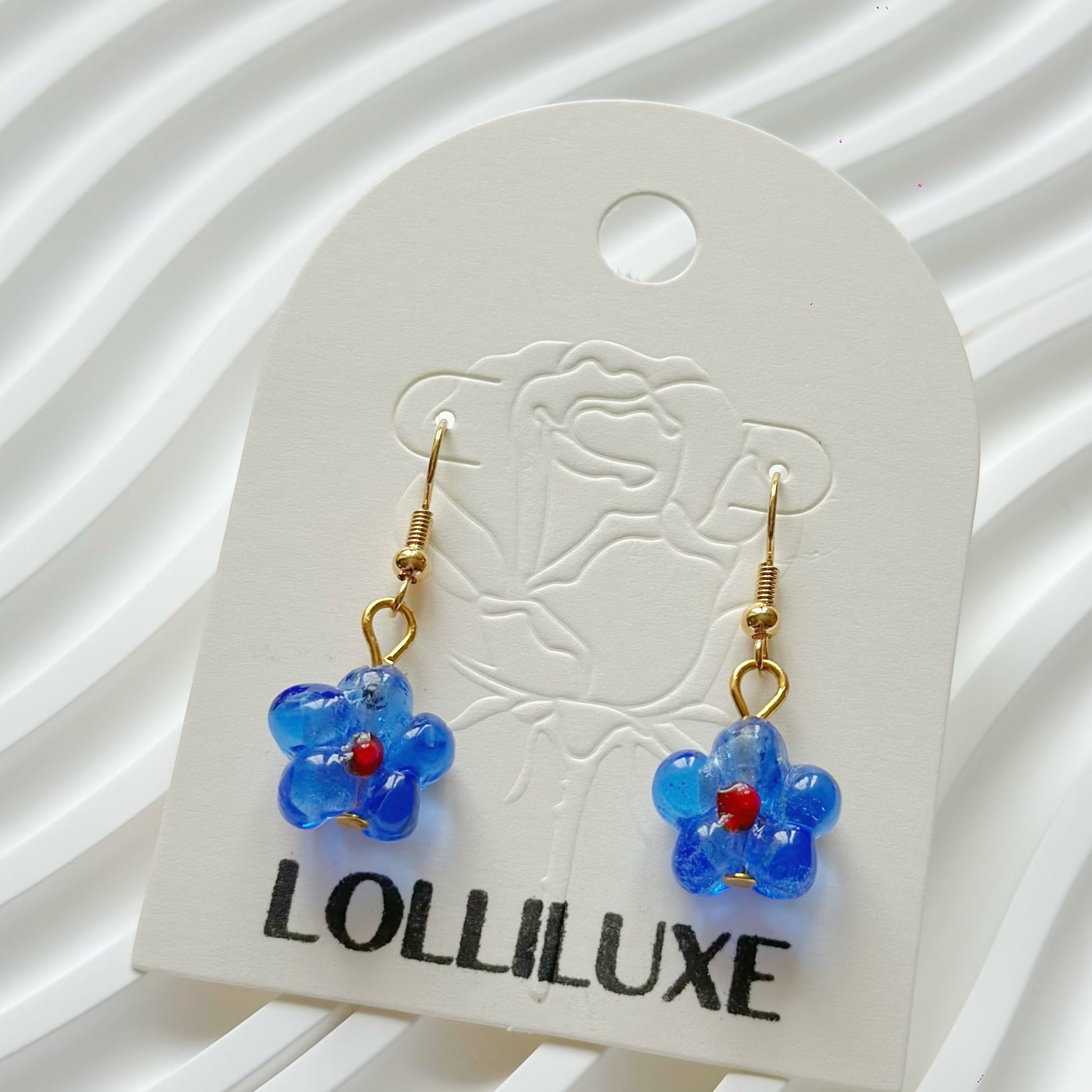 LolliLuxe Jewelry handcrafted glass earrings.